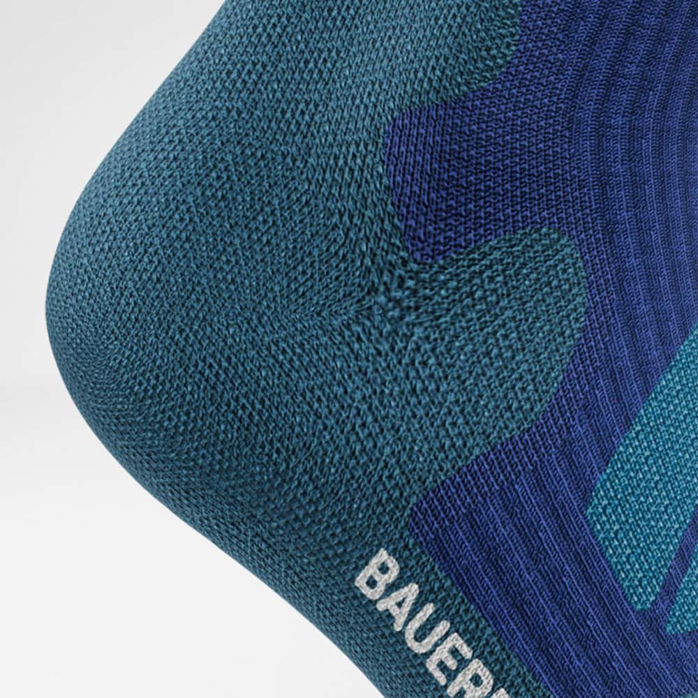 Detailed view of the heel of the merino hiking socks in dark blue